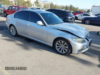 2011 BMW 3 Series 328i with VIN WBAPH7C5XBE682542, listed as a IAAI auction lot 41973306 with 135,947 mi miles. Bid and sale history available at carsss.com. Image 1.
