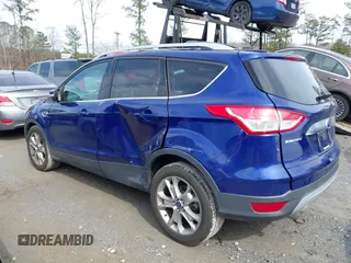 2016 Ford Escape Titanium with VIN 1FMCU9JXXGUA71898, listed as a IAAI auction lot 41758284 with 51,935 mi miles. Bid and sale history available at carsss.com. Image 14.