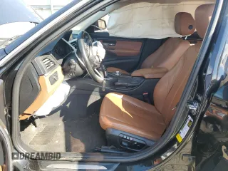2012 BMW 3 Series 328i with VIN WBA3A5C58CF348710, listed as a Copart auction lot 61266815 with 112,720 mi miles and Salvage title. Bid and sale history available at DreamBid. Image 7.