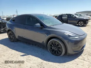 2023 Tesla Model Y Long Range z VIN 7SAYGDEE8PA185193, wystawiony jako Copart lot #48706215 z przebiegiem 10 451 mil mil oraz Szkoda całkowita • Salvage title. Historia ofert i sprzedaży dostępna na DreamBid. Obrazek 4.