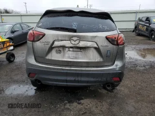 2015 Mazda CX-5 Grand Touring with VIN JM3KE4DY6F0528286, listed as a Copart auction lot 52367765 with Not Provided miles and Salvage Title. Bid and sale history available at DreamBid. Image 6.
