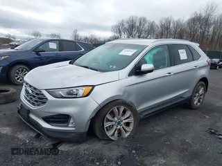 2019 Ford Edge Titanium with VIN 2FMPK4K95KBB55619, listed as a IAAI auction lot 42048941 with 89,999 mi miles. Bid and sale history available at carsss.com. Image 17.