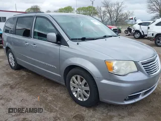 2014 Chrysler Town & Country Touring with VIN 2C4RC1BG7ER208324, listed as a IAAI auction lot 42102263 with 223,953 mi miles. Bid and sale history available at carsss.com. Image 1.