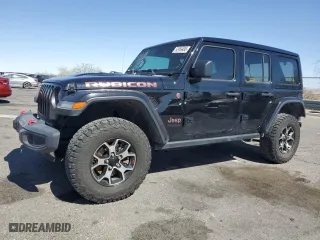 2021 Jeep Wrangler Unlimited Rubicon with VIN 1C4HJXFN4MW517400, listed as a Copart auction lot 52959495 with 31,874 mi miles and Salvage Title. Bid and sale history available at carsss.com. Image 1.
