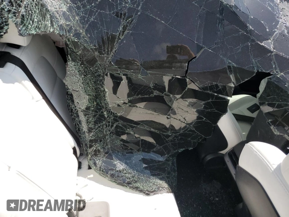 2022 Tesla Model Y Long Range z VIN 7SAYGDEE8NF447410, wystawiony jako Copart lot #54860765 z przebiegiem Nie podano mil oraz Szkody całkowita. Historia ofert i sprzedaży dostępna na DreamBid. Obrazek 10.