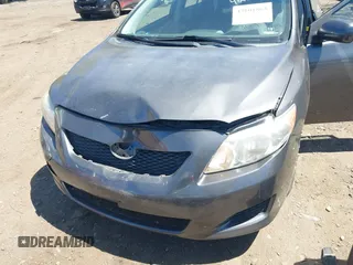 2010 Toyota Corolla with VIN 2T1BU4EE5AC527290, listed as a IAAI auction lot 42101864 with 77,908 mi miles. Bid and sale history available at carsss.com. Image 6.