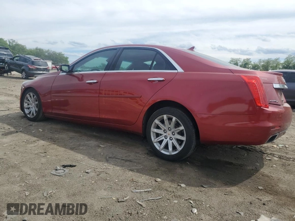 2014 Cadillac CTS Luxury AWD with VIN 1G6AX5SX0E0154757, listed as a Copart auction lot 56317425 with 156,719 mi miles and Salvage title. Bid and sale history available at DreamBid. Image 2.