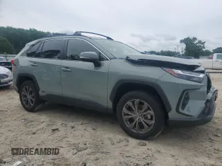 2023 Toyota RAV4 Hybrid XLE Premium with VIN JTMB6RFV8PD097109, listed as a Copart auction lot 59970995 with 43,197 mi miles and Salvage title. Bid and sale history available at DreamBid. Image 4.