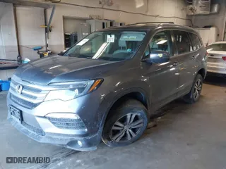 2016 Honda Pilot EX-L with VIN 5FNYF6H55GB103141, listed as a IAAI auction lot 41535841 with 129,231 mi miles. Bid and sale history available at carsss.com. Image 2.