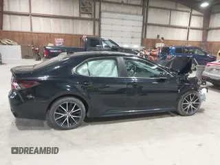 2021 Toyota Camry SE Nightshade with VIN 4T1T11AK2MU483971, listed as a IAAI auction lot 41934957 with 61,618 mi miles and . Bid and sale history available at DreamBid. Image 13.