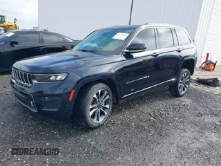 2023 Jeep Grand Cherokee Overland with VIN 1C4RJHDG8P8822650, listed as a IAAI auction lot 42145252 with 63,100 mi miles and . Bid and sale history available at DreamBid. Image 2.