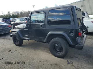 2002 Jeep Wrangler SE with VIN 1J4FA29P82P732805, listed as a Copart auction lot 86017044 with 138,679 mi miles and Salvage Title. Bid and sale history available at DreamBid. Image 2.
