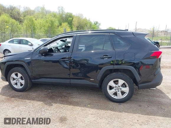 2021 Toyota RAV4 Hybrid LE with VIN 2T3L6RFV7MW011159, listed as a IAAI auction lot 42212998 with 104,626 mi miles and . Bid and sale history available at DreamBid. Image 14.
