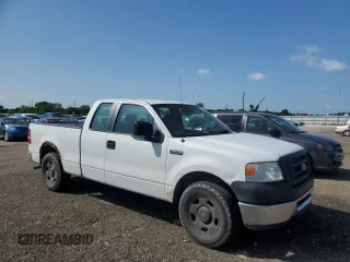 2007 Ford F-150 STX with VIN 1FTRX12W47FB00233, listed as a Copart auction lot 61870565 with 205,846 mi miles and Clean title. Bid and sale history available at DreamBid. Image 4.