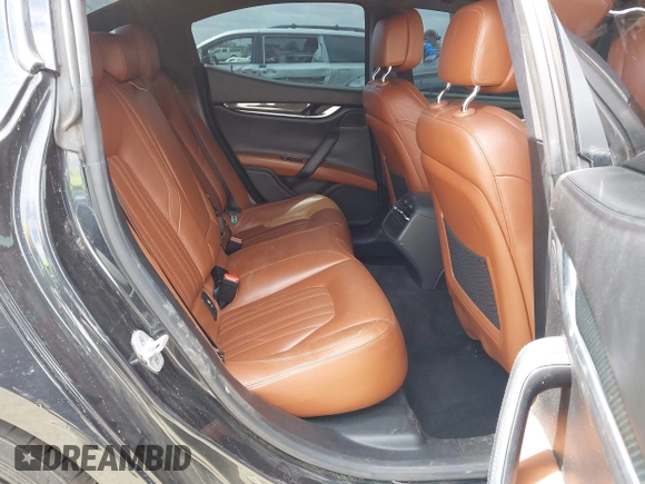 2014 Maserati Ghibli S Q4 with VIN ZAM57RTA0E1101059, listed as a IAAI auction lot 42121292 with 107,901 mi miles and . Bid and sale history available at DreamBid. Image 8.
