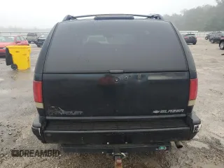 1995 Chevrolet Blazer с VIN 1GNCS13W5S2165022, выставлен на аукционе Copart как лот 58006505 с пробегом 318 061 миль миль и Списание • Salvage title. История ставок и продаж доступна на DreamBid. Изображение 6.