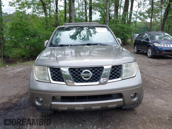 2005 Nissan Pathfinder SE z VIN 5N1AR18WX5C748572, wystawiony jako IAAI lot #42180475 z przebiegiem 291 301 mil mil oraz . Historia ofert i sprzedaży dostępna na DreamBid. Obrazek 12.