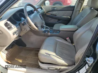 1996 Acura RL with VIN JH4KA965XTC009917, listed as a Copart auction lot 65083665 with 197,486 mi miles and Salvage title. Bid and sale history available at DreamBid. Image 7.