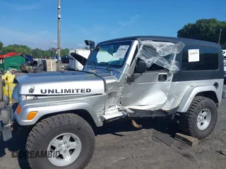2005 Jeep Wrangler Unlimited with VIN 1J4FA44S55P352803, listed as a IAAI auction lot 42688284 with 128,586 mi miles and . Bid and sale history available at DreamBid. Image 6.