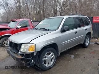2005 GMC Envoy SLE with VIN 1GKDT13S552332088, listed as a IAAI auction lot 41699178 with 196,869 mi miles. Bid and sale history available at carsss.com. Image 2.