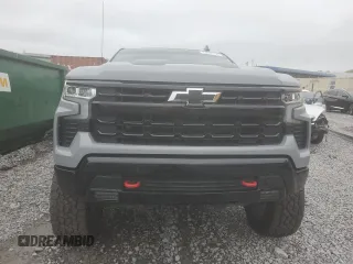 2024 Chevrolet Silverado 1500 LT Trail Boss with VIN 3GCUDFE85RG145776, listed as a Copart auction lot 51293175 with 20,719 mi miles and Salvage Title. Bid and sale history available at DreamBid. Image 5.