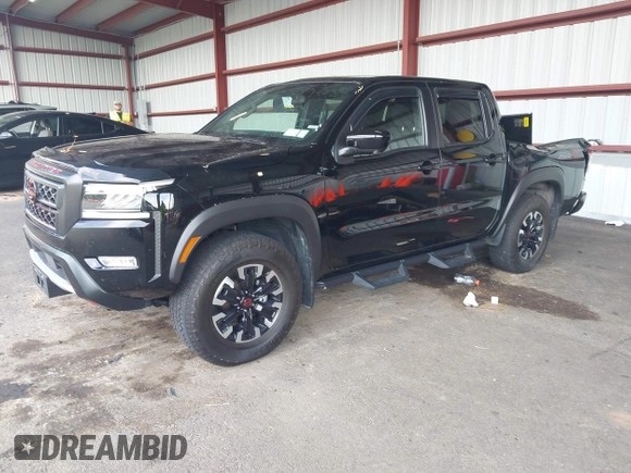 2023 Nissan Frontier SV with VIN 1N6ED1EK1PN634535, listed as a IAAI auction lot 42748147 with 32,304 mi miles and . Bid and sale history available at DreamBid. Image 2.