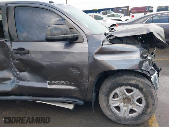 2014 Toyota Tundra SR5 z VIN 5TFEM5F16EX082421, wystawiony jako IAAI lot #40735426 z przebiegiem 173 005 mil mil oraz . Historia ofert i sprzedaży dostępna na DreamBid. Obrazek 16.