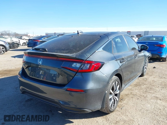 2024 Honda Civic EX-L z VIN 19XFL1H79RE002343, wystawiony jako IAAI lot #41691984 z przebiegiem 42 062 mil mil oraz . Historia ofert i sprzedaży dostępna na DreamBid. Obrazek 4.