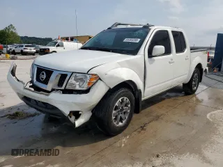 2017 Nissan Frontier Pro-4X with VIN 1N6DD0EV1HN708098, listed as a Copart auction lot 59385255 with 75,818 mi miles and Salvage title. Bid and sale history available at DreamBid. Image 1.