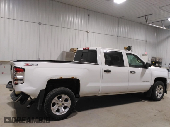 2014 Chevrolet Silverado 1500 LT with VIN 3GCUKREC7EG162830, listed as a Copart auction lot 49585565 with 207,709 mi miles and Salvage Title. Bid and sale history available at DreamBid. Image 3.