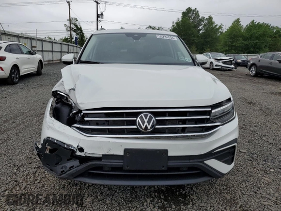 2024 Volkswagen Tiguan SE with VIN 3VVMB7AX7RM174711, listed as a Copart auction lot 56781655 with 7,253 mi miles and Salvage title. Bid and sale history available at DreamBid. Image 5.