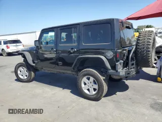 2013 Jeep Wrangler Unlimited Rubicon 10th Anniversary with VIN 1C4HJWFG4DL550832, listed as a Copart auction lot 71633684 with 60,759 mi miles and Salvage title. Bid and sale history available at DreamBid. Image 2.
