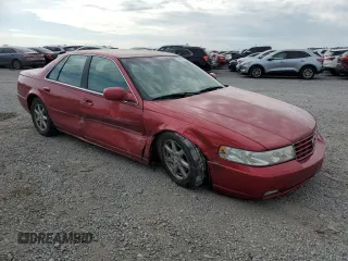 2004 Cadillac Seville Luxury SLS z VIN 1G6KS54YX4U100916, wystawiony jako Copart lot #54471295 z przebiegiem 59 059 mil mil oraz Szkody całkowita. Historia ofert i sprzedaży dostępna na DreamBid. Obrazek 4.