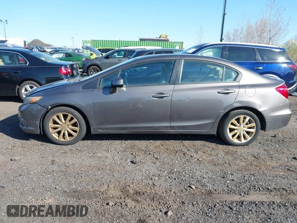 2012 Honda Civic EX with VIN 19XFB2F8XCE035220, listed as a IAAI auction lot 41993569 with 199,672 mi miles and . Bid and sale history available at DreamBid. Image 14.