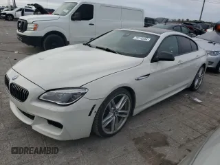 2017 BMW 6 Series 650i with VIN WBA6D4C54HD977706, listed as a Copart auction lot 79116554 with 87,039 mi miles and Salvage Title. Bid and sale history available at carsss.com. Image 1.