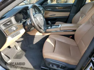 2015 BMW 7 Series 750i xDrive with VIN WBAYB6C53FD966042, listed as a Copart auction lot 69387464 with 64,977 mi miles and Salvage Title. Bid and sale history available at carsss.com. Image 7.