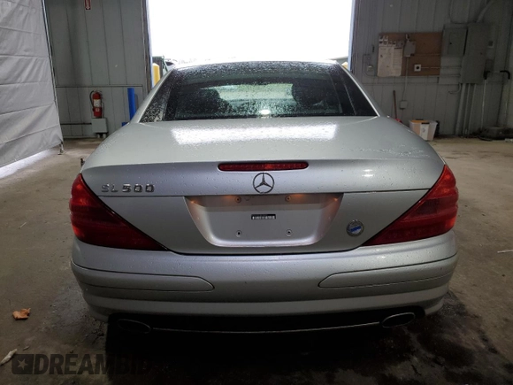 2003 Mercedes-Benz SL 500 z VIN WDBSK75FX3F061879, wystawiony jako Copart lot #55930265 z przebiegiem 117 824 mil mil oraz Tytuł czysty. Historia ofert i sprzedaży dostępna na DreamBid. Obrazek 6.