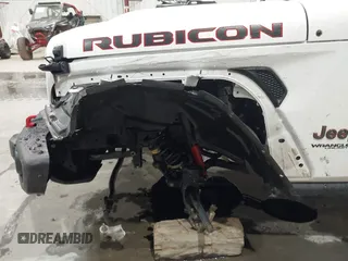 2021 Jeep Wrangler Unlimited Rubicon with VIN 1C4HJXFN2MW809904, listed as a IAAI auction lot 41567956 with 34,000 mi miles and . Bid and sale history available at DreamBid. Image 6.