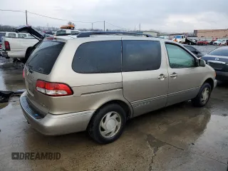 2002 Toyota Sienna LE with VIN 4T3ZF13C82U492678, listed as a Copart auction lot 84123944 with 138,763 mi miles and Clean Title. Bid and sale history available at carsss.com. Image 3.