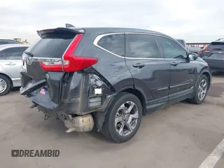 2018 Honda CR-V EX-L z VIN 7FARW1H87JE055784, wystawiony jako IAAI lot #42028869 z przebiegiem 135 222 mil mil oraz . Historia ofert i sprzedaży dostępna na DreamBid. Obrazek 4.