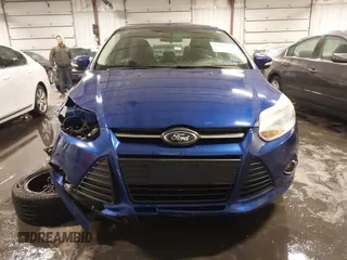 2013 Ford Focus SE z VIN 1FADP3F2XDL124732, wystawiony jako IAAI lot #41510140 z przebiegiem 69 819 mil mil oraz . Historia ofert i sprzedaży dostępna na DreamBid. Obrazek 13.