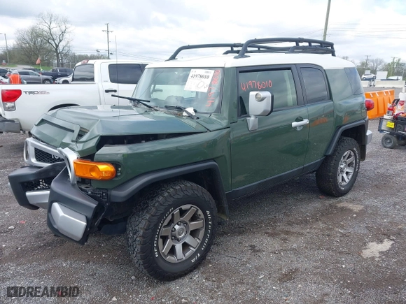 2014 Toyota FJ Cruiser with VIN JTEBU4BF1EK203587, listed as a IAAI auction lot 41978010 with 62,438 mi miles. Bid and sale history available at carsss.com. Image 2.
