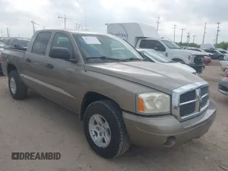 2006 Dodge Dakota SLT with VIN 1D7HE48N16S703072, listed as a IAAI auction lot 42156709 with 102,919 mi miles. Bid and sale history available at carsss.com. Image 1.