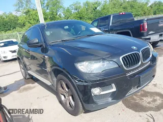 2014 BMW X6 xDrive35i with VIN 5UXFG2C5XE0C43526, listed as a IAAI auction lot 42121122 with 199,564 mi miles. Bid and sale history available at carsss.com. Image 1.