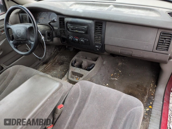 2001 Dodge Dakota z VIN 1B7GL22X41S256594, wystawiony jako Copart lot #43012935 z przebiegiem 217 179 mil mil oraz Szkoda całkowita • Salvage title. Historia ofert i sprzedaży dostępna na DreamBid. Obrazek 8.