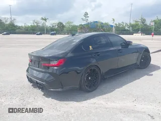 2024 BMW M3 Competition with VIN WBS33AY0XRFS35085, listed as a IAAI auction lot 42353608 with 6,991 mi miles and . Bid and sale history available at DreamBid. Image 4.