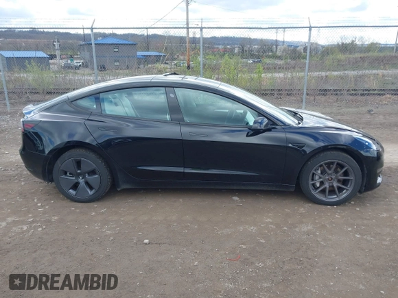 2021 Tesla Model 3 Long Range with VIN 5YJ3E1EB7MF052988, listed as a IAAI auction lot 42052662 with 29,877 mi miles and . Bid and sale history available at carsss.com. Image 13.