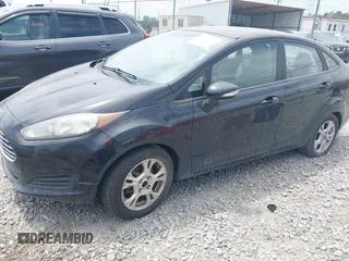2014 Ford Fiesta SE z VIN 3FADP4BJXEM232657, wystawiony jako IAAI lot #42132147 z przebiegiem 290 396 mil mil oraz . Historia ofert i sprzedaży dostępna na DreamBid. Obrazek 2.