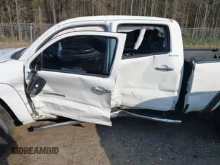 2015 Toyota Tacoma with VIN 3TMMU4FN5FM073323, listed as a IAAI auction lot 41800476 with 132,250 mi miles and . Bid and sale history available at DreamBid. Image 6.