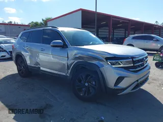 2022 Volkswagen Atlas SE z VIN 1V2HR2CA9NC518394, wystawiony jako IAAI lot #41702134 z przebiegiem 28 685 mil mil oraz . Historia ofert i sprzedaży dostępna na DreamBid. Obrazek 1.